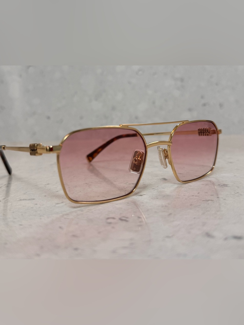 Miu Miu Gold Frame Sunglasses with Pink Gradient Lenses